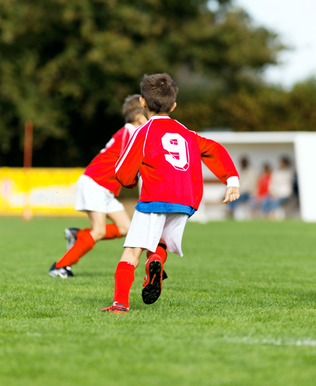 young-football-players-jfk-Institution